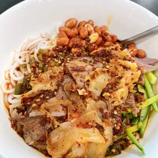 Heng Yang  style rice Noodle, the sour bean with the chili oil ! I would say they're the best matched with the rice noodles!