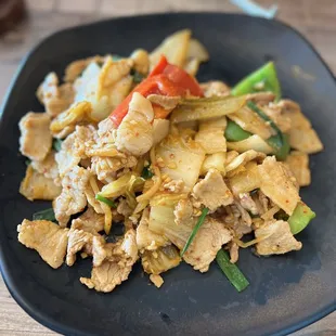a plate of stir fried vegetables