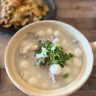 a bowl of soup on a table