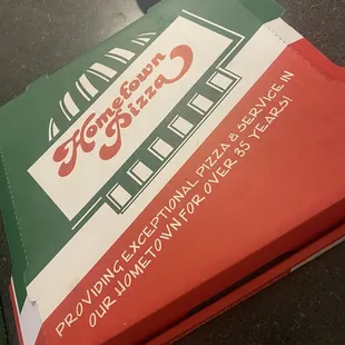 a pizza box on a table