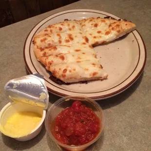 Small order of breadsticks are delish and come with two sauces. Garlic butter and tomato.