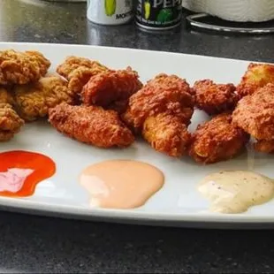 Our Traditional and Boneless wings coated with one of our 7 sauces