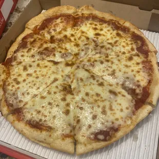 a cheese pizza in a box
