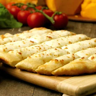 a flatbread pizza with cheese and sauce