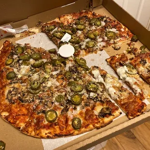 a whole pizza in a box