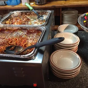 Potatos and baked spaghetti offered on the lunch buffet