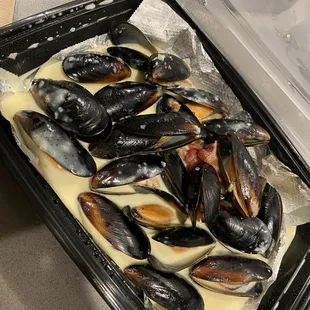 Steamed Mussels in garlic wine sauce. We discovered bacon this time.