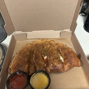 Calzone with pepperoni, sausage, and meatballs