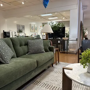 Green couch and love seat