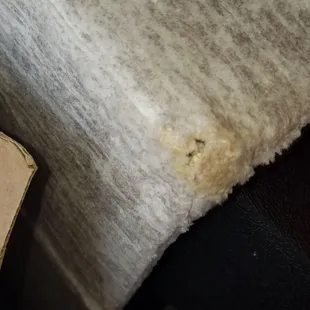 Damaged sofa (lower front corner)