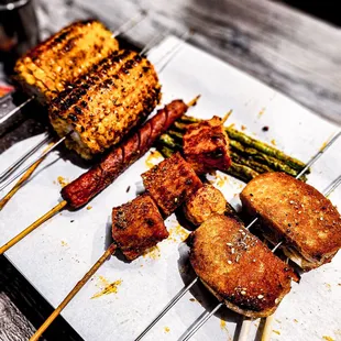 Corn, sausage, fish tofu, steamed bun, green beans