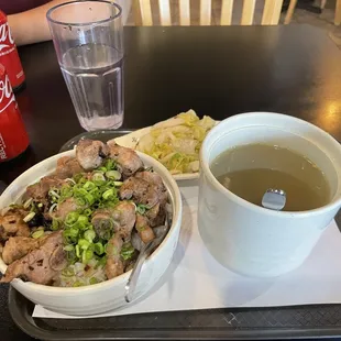 a bowl of soup and a bowl of chicken
