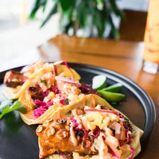 two tacos on a plate