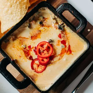 a bowl of quesadilla with tortilla chips
