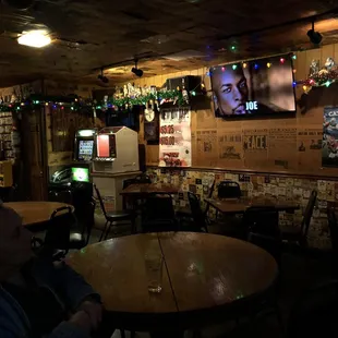 a man sitting at a table in a pub