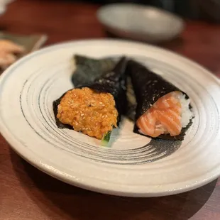 Spicy salmon handroll and salmon handroll