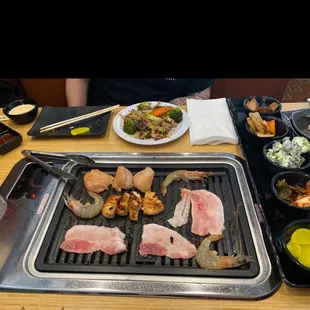 a variety of foods on a grill