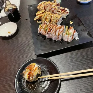 Sushi rolls: dynamite roll, Las Vegas roll, and crunchy dynamite roll (from closest to furthest)