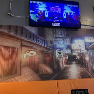Cool mural &amp; videos playing constantly