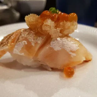 Seared salmon belly with salmon eggs