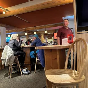 people sitting at the bar