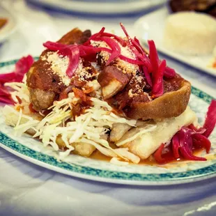 Yucca con Chicharron *Boiled Yucca/Cassava with Pork Rinds
