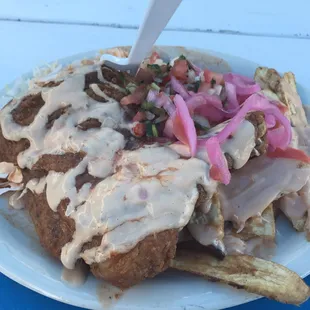 Combo #5 chicken dark meat, plantains and slaw. Loved the sauce