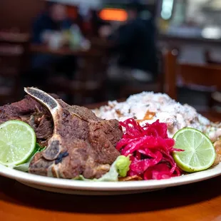 chuleta con tajadas (pork chop &amp; plantains) $18