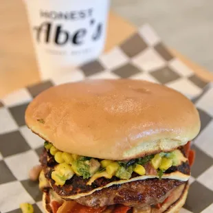 a burger and a cup of coffee