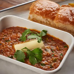 a plate of food with bread and butter