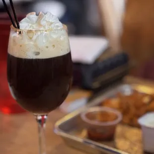 Spanish Coffee ~$12 Tia Maria, Orange liqueur, Brandy, Coffee, Whipped Cream, Cinnamon sugar rim