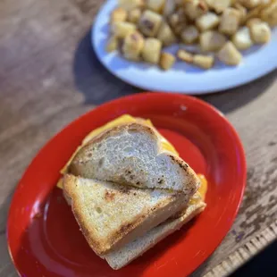 Breakfast Sandwich with no meat, home fries on the side