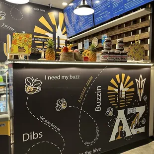 a bar with a menu on the wall