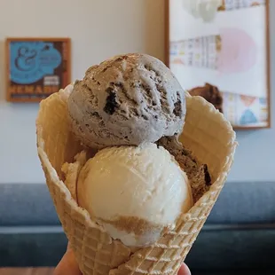 Salted Caramel and Cookies and Cream split scoop in a homemade cone