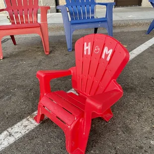 Anorak chairs for those big and small! These are under a tent outside.