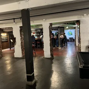 a pool table in the middle of the room
