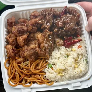Combo Plate - Overall really happy with this place. Szechuan Chicken &amp; Orange Beef, along with fried rice and lo mein. Will be back!