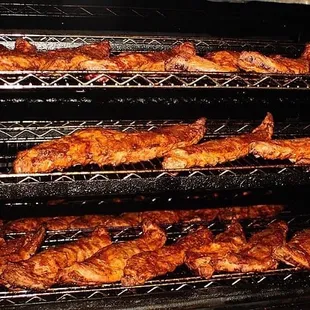 chicken cooking in the oven