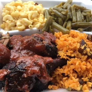 Jerk chicken dinner with Mac n cheese and green beans. Definitely comfort eats