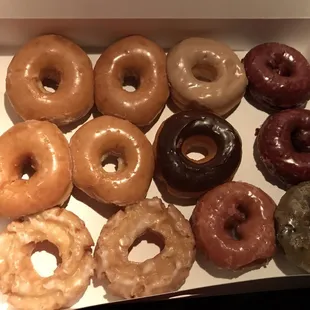 4 glazed, 2 old fashioned, 2 red velvet, 1 strawberry, 1 blueberry, 1 chocolate, and 1 maple.