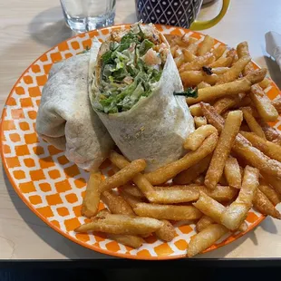 Buffalo chicken wrap and really tasty fries