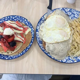 Honeyberry pancakes and biscuits and gravy with eggs and potatoes