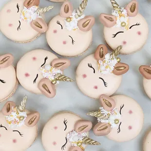 a close up of a bunch of unicorn macarons