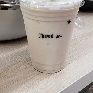 a cup of coffee with whipped cream