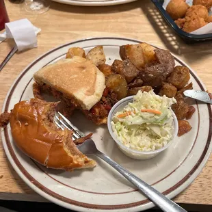 BBQ sandwich fried potatoes and coleslaw  very tasty