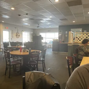 Part of restaurant, wooden chairs