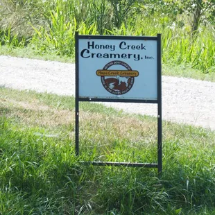 a sign for honey creek creamery