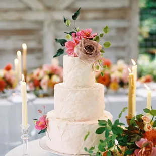 Textured cake with edible wafer paper details, and hand made sugar flowers. Image courtesy of Blue Rose Photography.