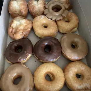 Buttermilk, regular glazed, chocolate glazed, maple glazed. Baker&apos;s dozen, thanks for the free donut.