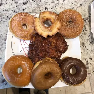 Sugar, old fashioned, cinnamon crunch, apple fritter, glaze, chocolate and maple rounds